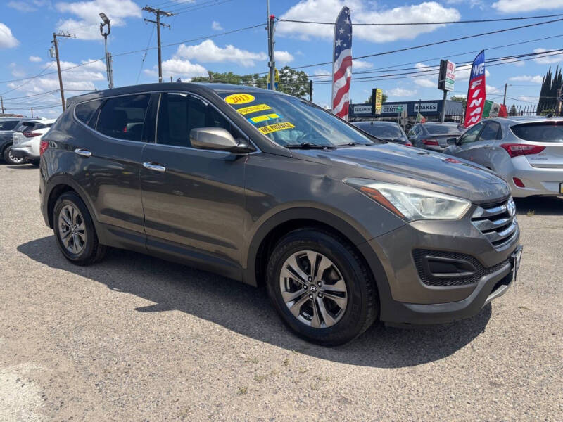 hyundai santa fe 2013 5XYZTDLBXDG045451 image hyundai santa fe 2013 5XYZTDLBXDG045451 image